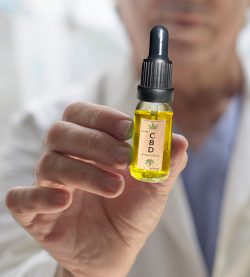 Close,Up,Of,Cbd,Oil,And,Doctor